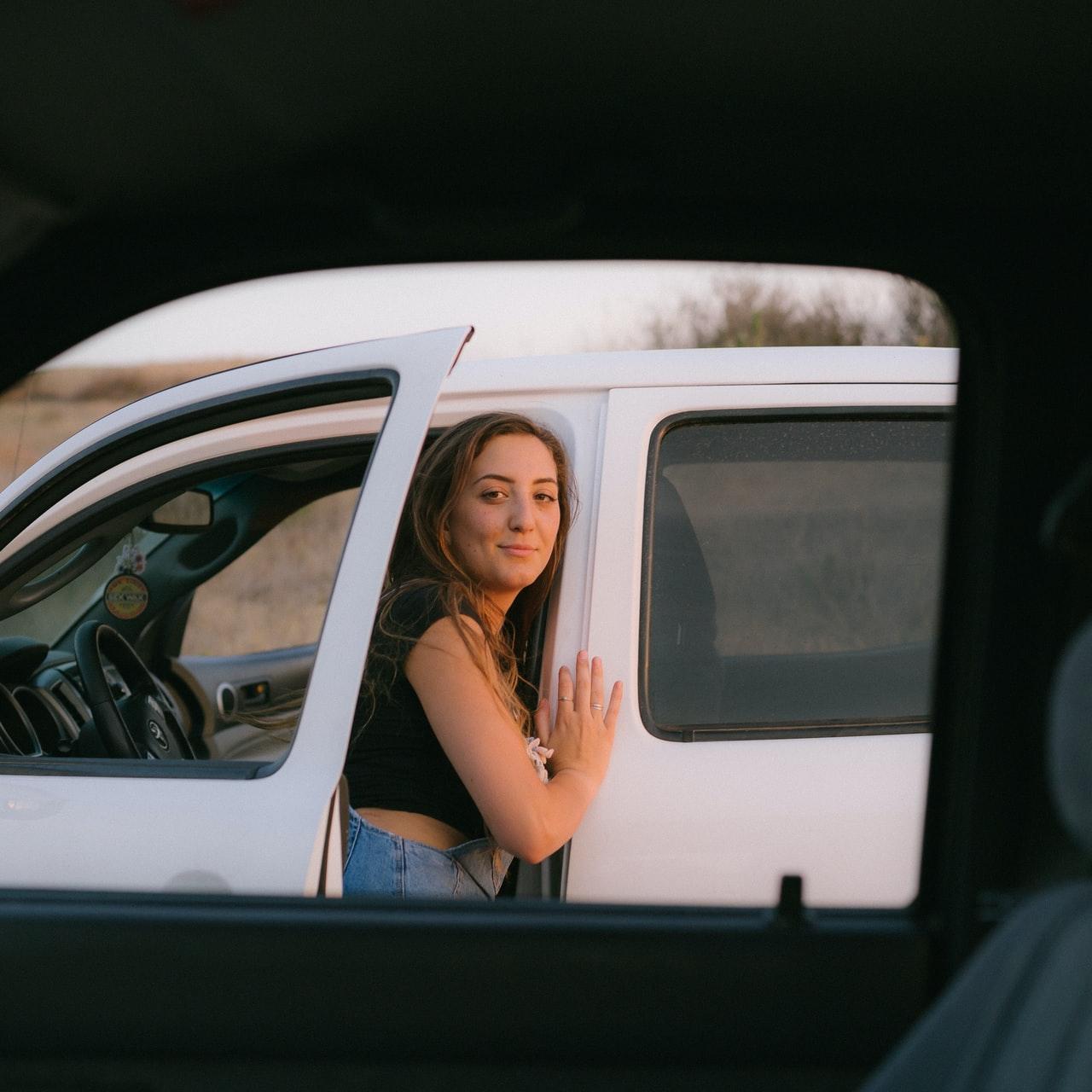 woman getting out the car